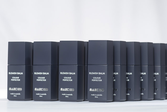oil-free bb cream in a blue glass bottles offering 12 shades